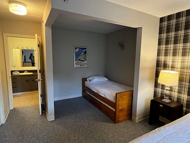 Sleeping nook with trundle bed