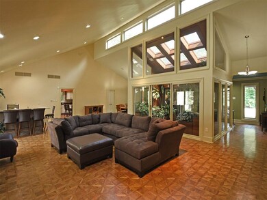 28X20 with Fireplace, Parquet Floors & View of Atr