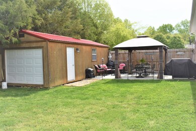 Huge storage building with garge doors on both ends.