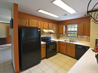 The spacious kitchen has lots of counter space.  T