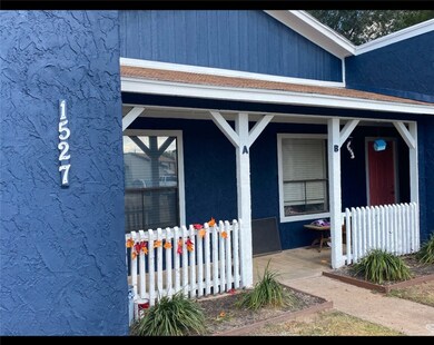 Property entrance featuring covered porch