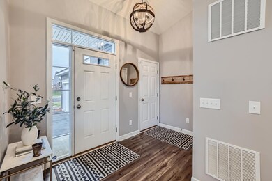 Beautiful entryway to impress your guests. Nice big closet for coats and shoes, EZ access to the garage to carry in groceries and the light makes a stunning impression