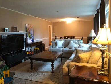 Fireplace behind TV Living room