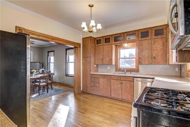 View of kitchen from rear sun room entry.