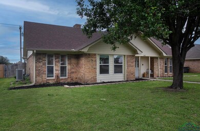 Ranch-style house with central air condition unit,