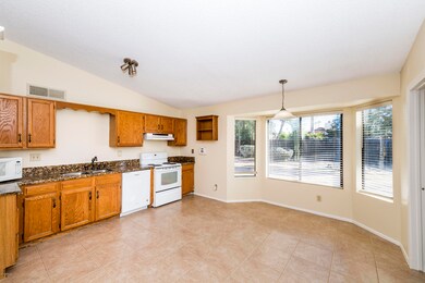 Kitchen with Granite and Bay Window Area