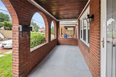 Charming Covered Front Patio Offers A Great Place