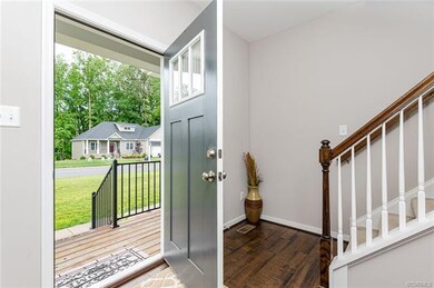 Inviting front entrance with triple pane transom