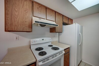1111 E University Dr, 223-7