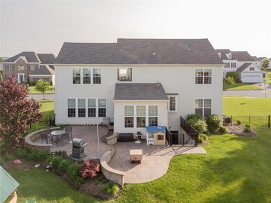 Stamped concrete patio and private basement entrance.
