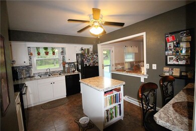 An efficient eat-in kitchen with a center island a