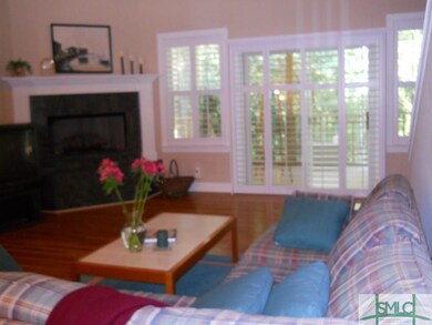 Great Room exits onto screen porch and has wooded 