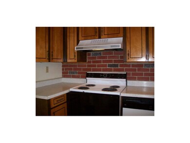 Kitchen w. elec. stove & hood