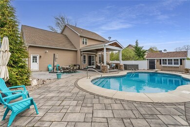OUTDOOR KITCHEN, STAMPED CONCRETE, HEATED IN-GROUN