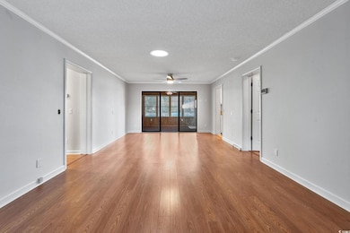 Unfurnished room featuring crown molding, ceiling 