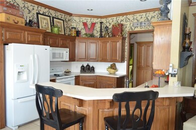 Large open kitchen is 11'X11' and has an abundance