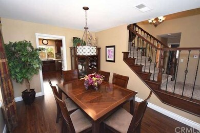 Formal dining room that leads into the kitchen.