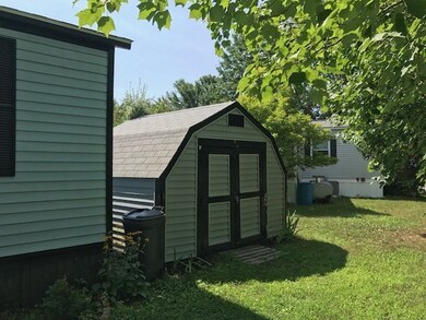 This shed is great for garden tools and extra storage for those things we can' live with out
