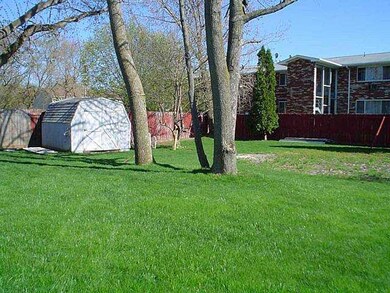 Exterior Back Fully Fenced backyard with large She
