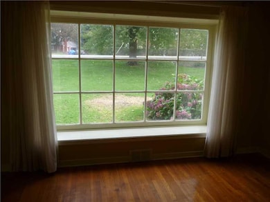 Living Room. ...huge box bay with window seat in f