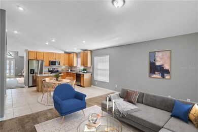 Virtually staged kitchen and family room