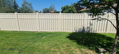 Newer vinyl privacy fence