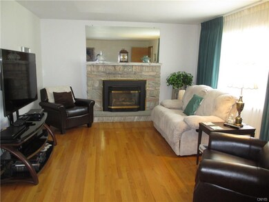 living room with gas fireplace with Arizona quartz