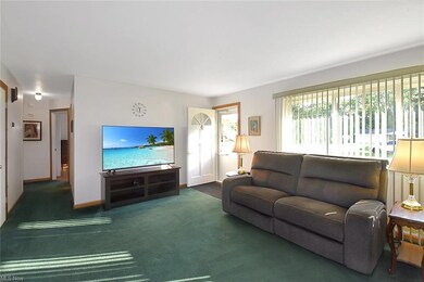 Living room featuring newer windows