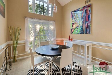 Formal Dining Room with tons of windows to make th