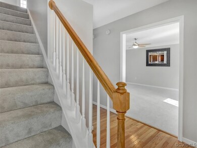 FOYER AREA WITH GLEAMING HARDWOOD FLOORS.  POWDER