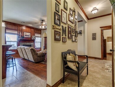 THIS ANGLE SHOWS THE FRONT ENTRACE AND OPEN FLOORP