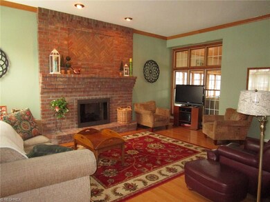 Beautiful Living Room with Fireplace and Hardwood 