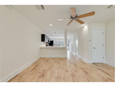 Unfurnished living room with recessed lighting, c
