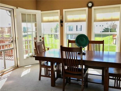 Sunroom with access to deck.