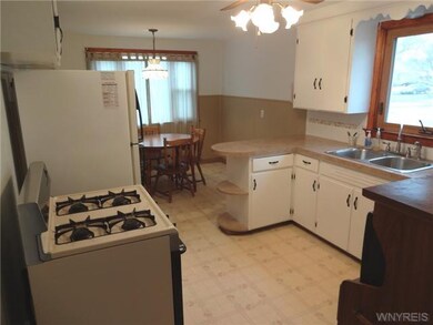 Kitchen. Appliances stay. ORIGINAL owners...backsplash & counters are new. Home FRESHLY PAINTED!!