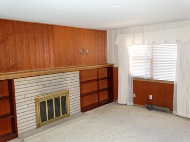 Den with vintage Weldtex wall panelling