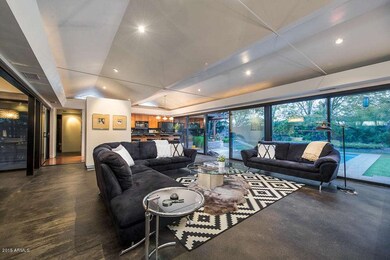 Great Room Surrounded by Glass Sliders