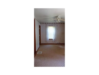 Entryway. Entryway opens to the front room.  Note 