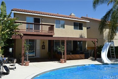 VIEW OF BACKYARD/COVERED PATIO/BALCONY.