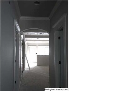 Pretty arch in hall going into kitchen
