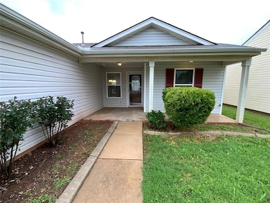 View of exterior entry featuring a porch