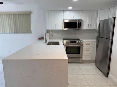 8031 Lagos de Campo Blvd unit L3, Tamarac, FL 33321 - photo 3