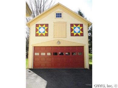 Stable/Barn Barn with barn quilts perched on full 