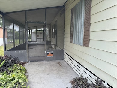View of home's exterior featuring a sunroom