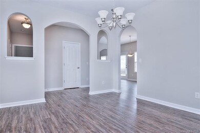 Dinning room with new flooring and paint.