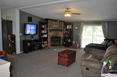 Huge family room with wood burning fireplace