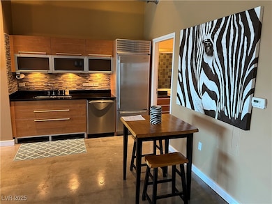 Kitchen featuring a sink, stainless steel applianc