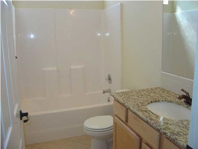 BATHROOM WITH GRANITE COUNTER TOP
