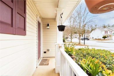 Balcony featuring a residential view and covered p