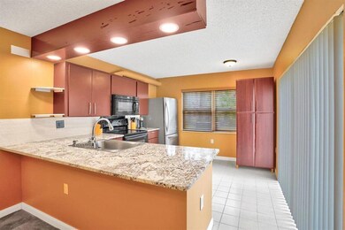 2 Amherst Ct unit D, Royal Palm Beach, FL 33411 - photo 4